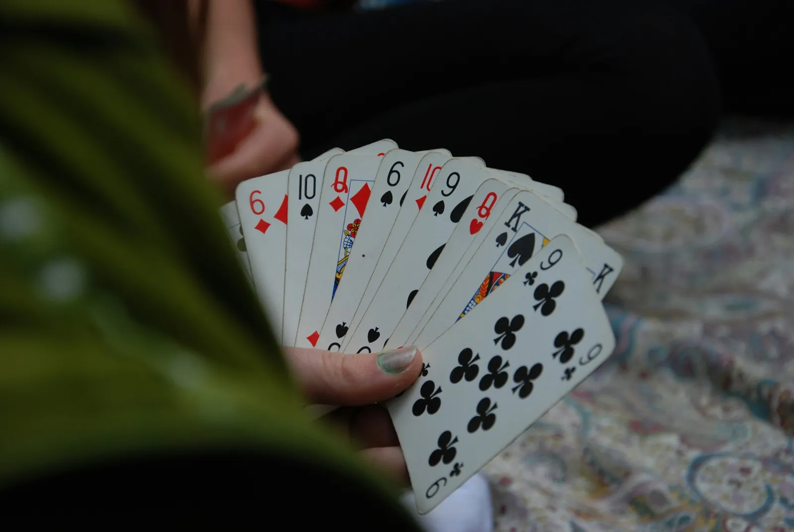 A hand of playing cards fanned out